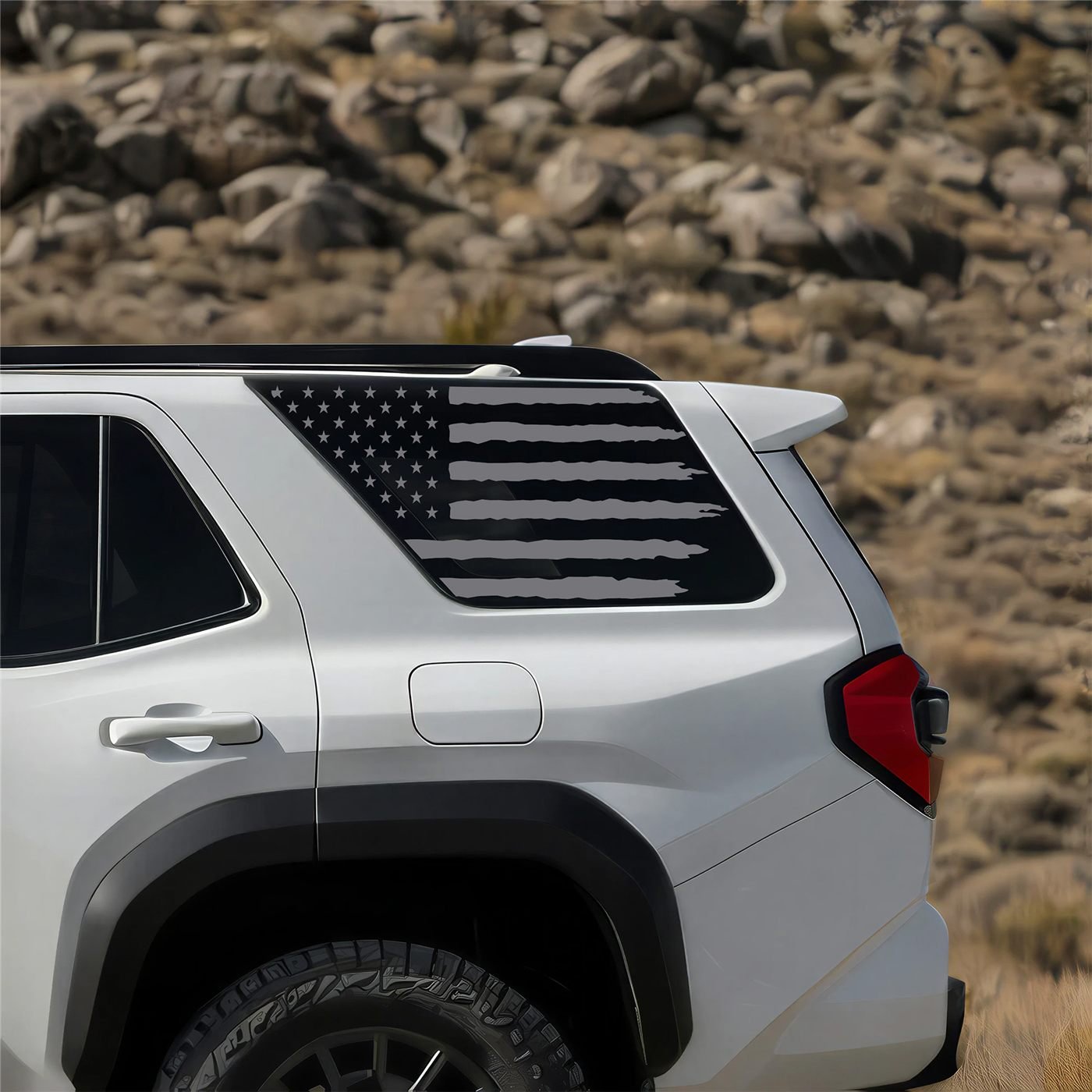 Distressed American flag decal on the rear quarter window of a 2025 Toyota 4Runner